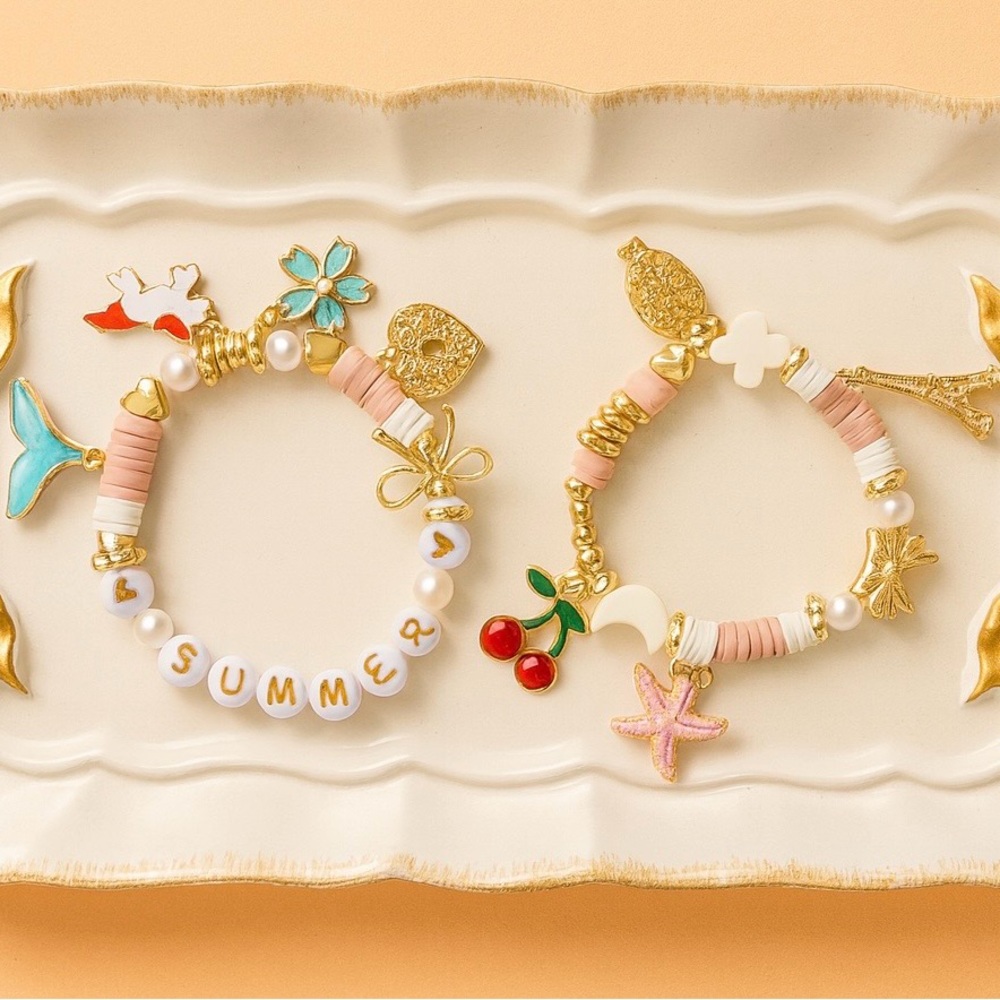 https://www.etsy.com/listing/4370253053/kids-charm-bracelet-set-of-2-handmade